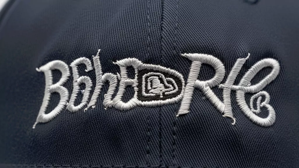Logo Distortion on Curved Cap Panels